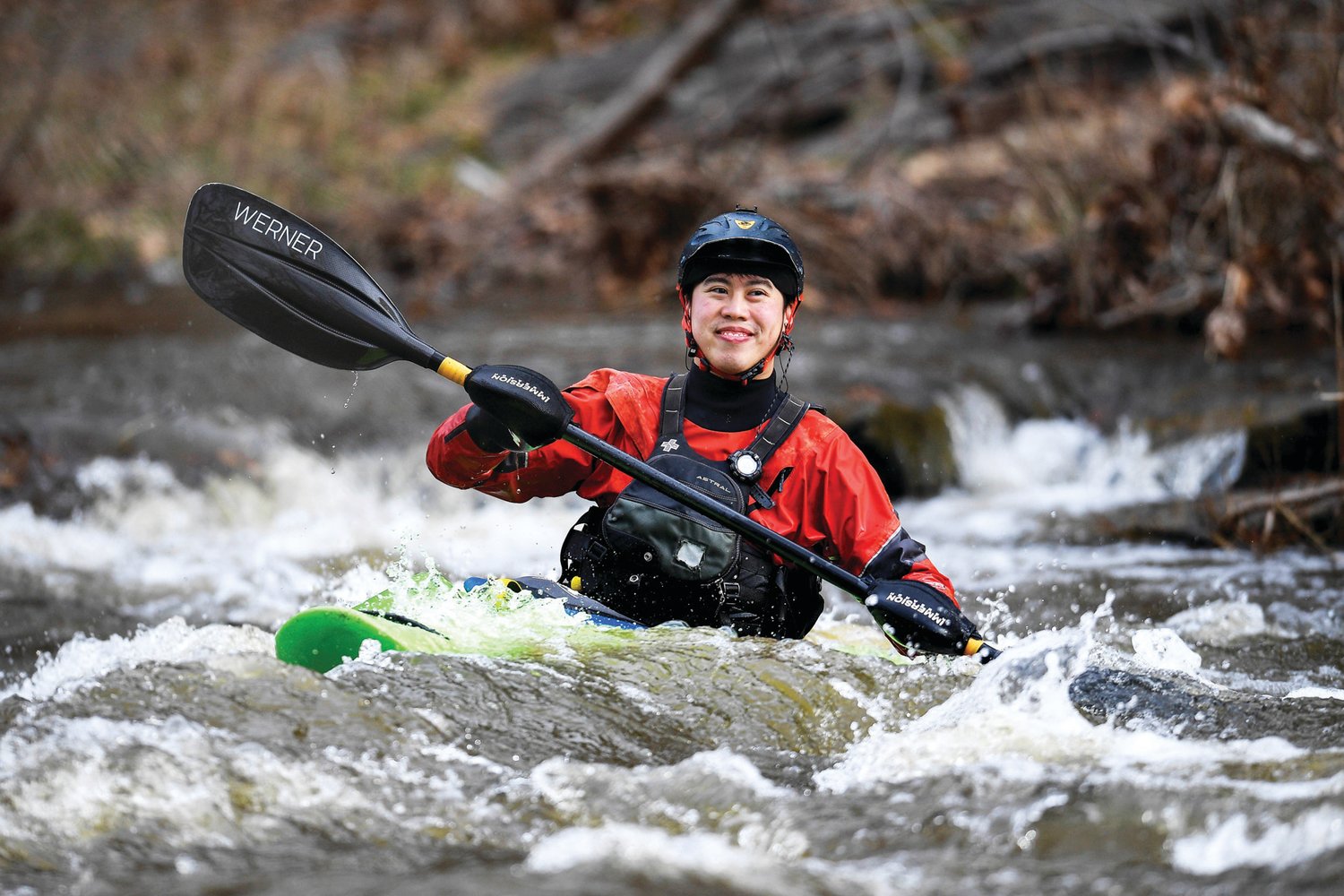 A whitewater paddling enthusiast is all smiles on the Tohickon Creek.