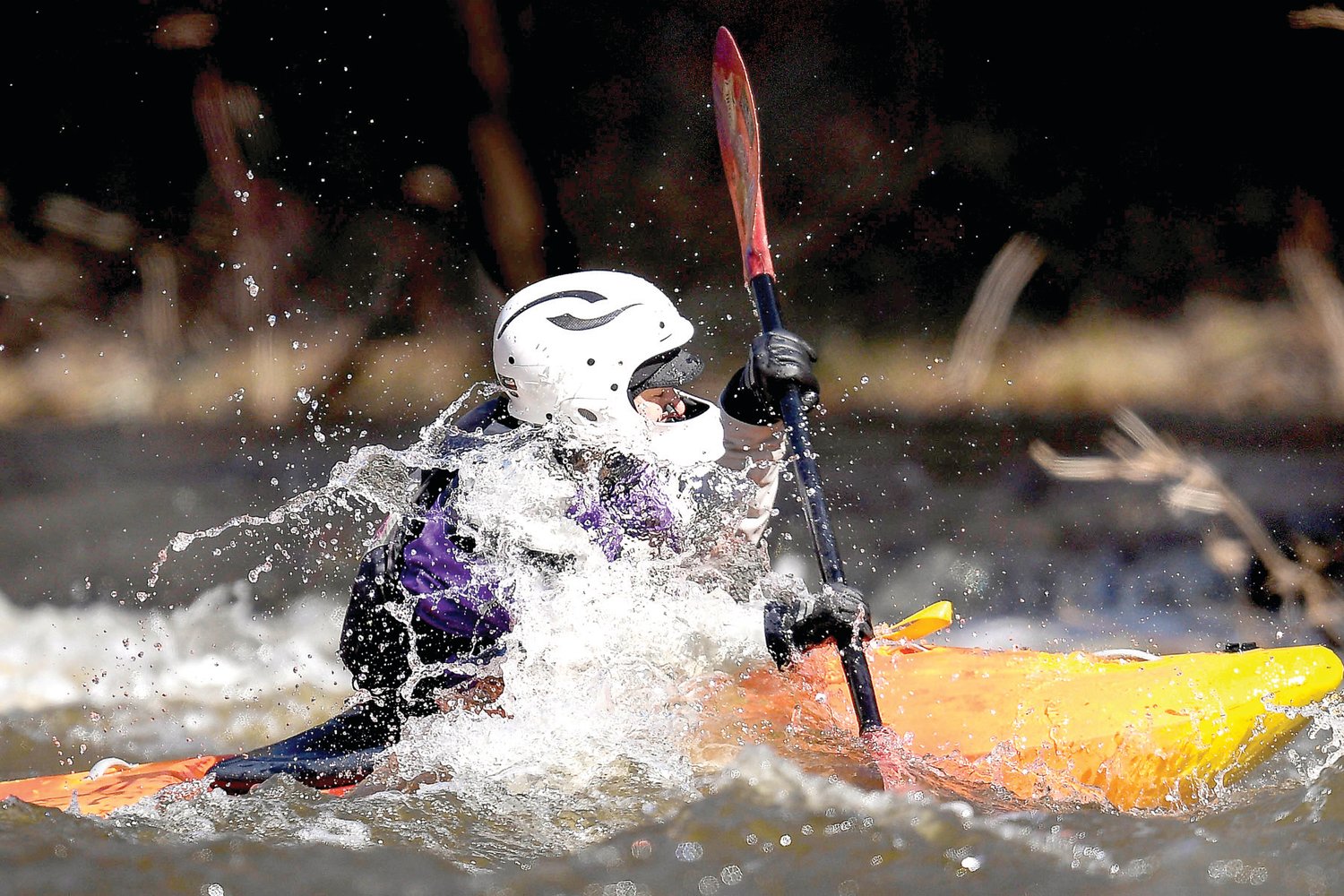 A kayaker navigates Tohickon Creek rapids on March 19.