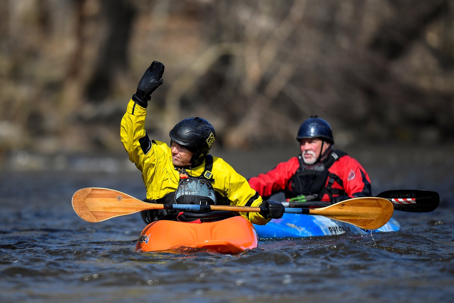 Kayakers signal the shuttle crews near the finish at Point Pleasant on March 18.