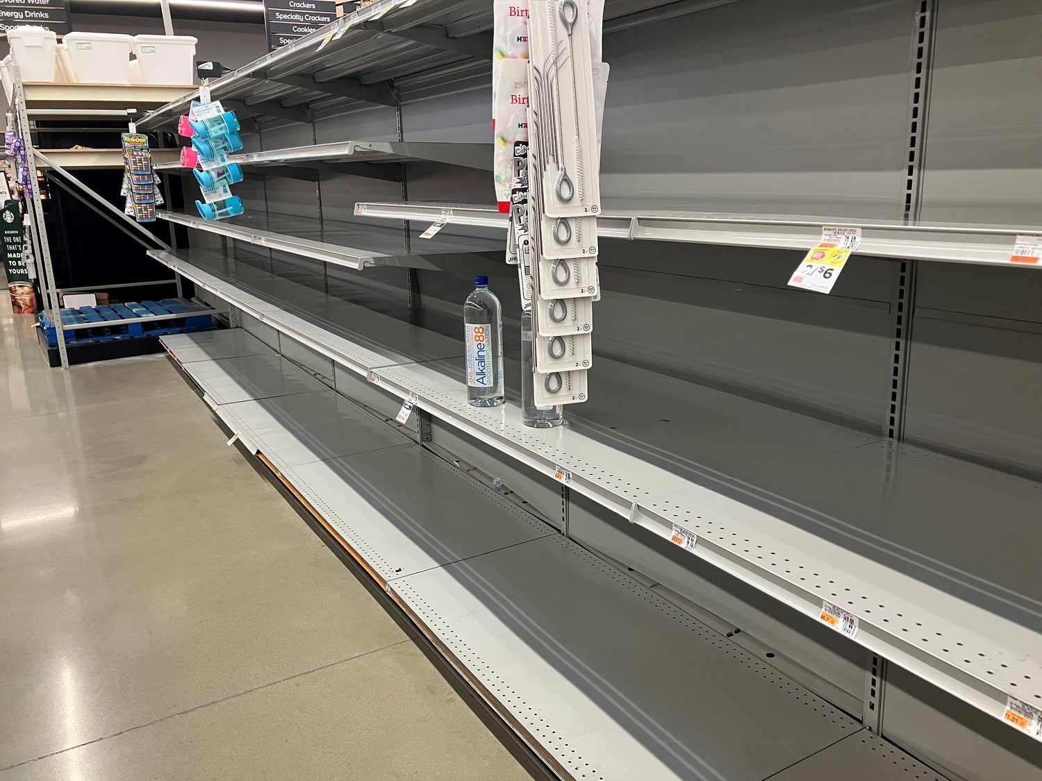 The shelves where cases of bottled water are typically kept were empty Monday afternoon at the Giant Food Stores location at Cross Keys Place on Swamp Road in Plumstead Township.