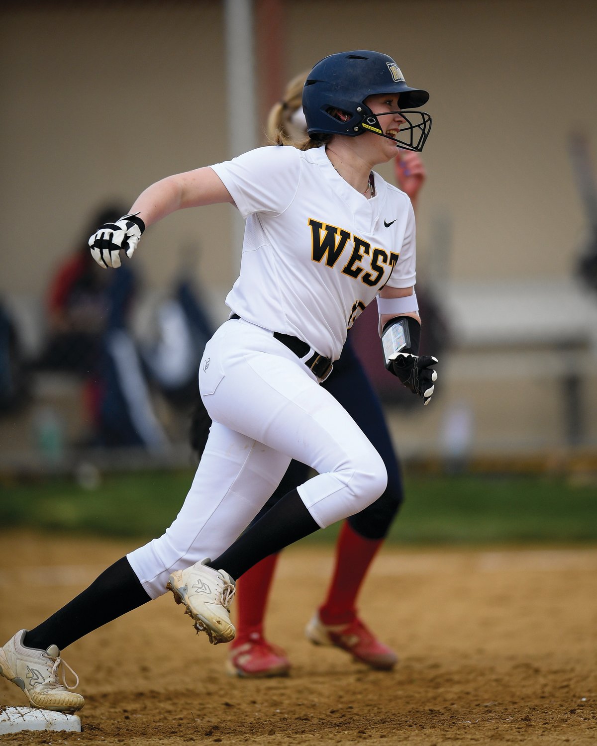 CB West’s Sienna Lawson rounds first base after a double in the third inning.