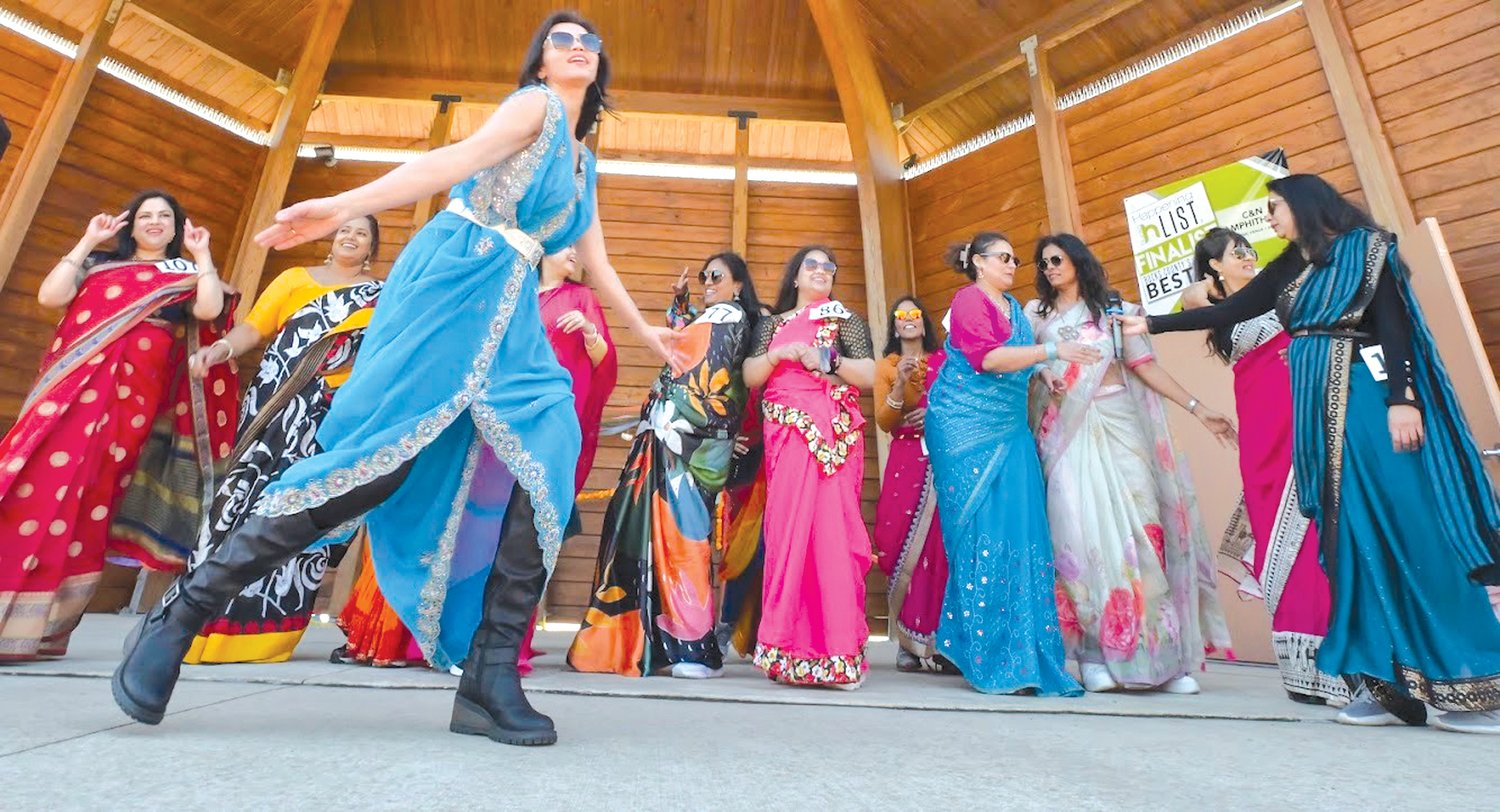 A woman dances at the Saree Run, held in Central Park in Doylestown on March 26.