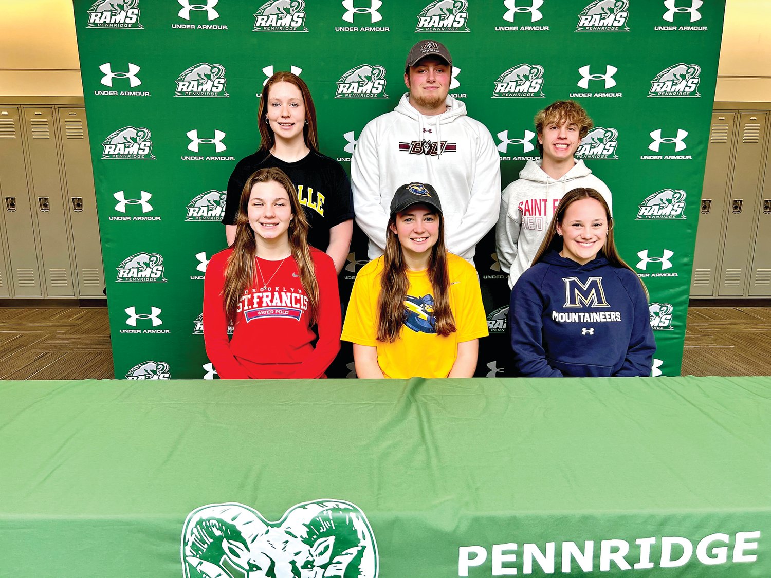 Six Pennridge seniors revealed their college selections on Feb. 28. From left are: front row, Emily Myers, Katie Yoder, Raegan Vesey; back row, Katelyn Cuthbert, Loughlin Smith and Dominic Galante.