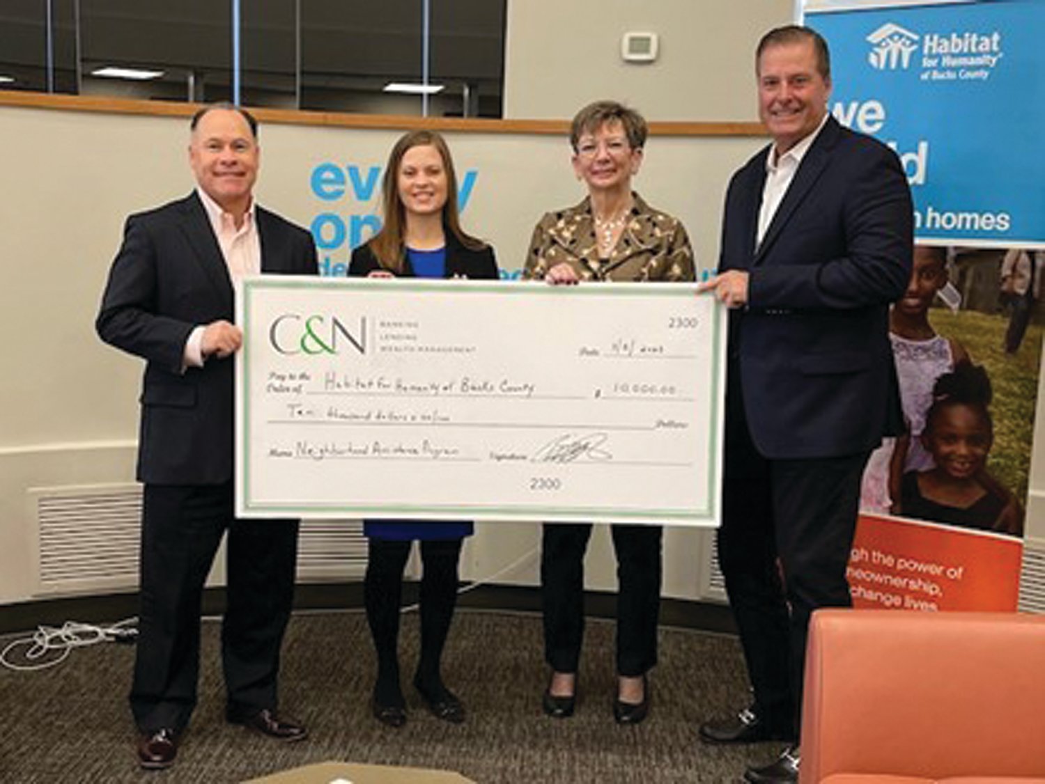 From left are Blair Rush, president Southeast Region, C&N; Kate Shepherd, VP; Commercial Lending Relationship Manager II, C&N; Florence Kawoczka, executive director, Habitat for Humanity of Bucks County; and Gary Pruden, board president, Habitat for Humanity of Bucks County.