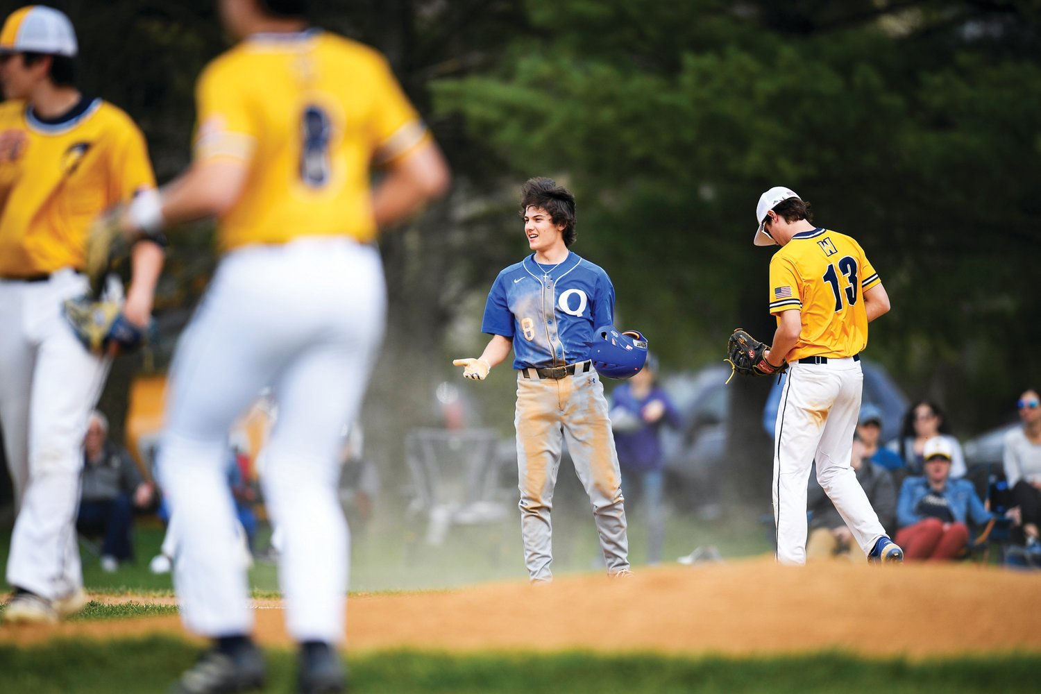 Quakertown’s Joey Pizzi questions the call after getting picked off by Wissahickon pitcher Adam Hajdak.