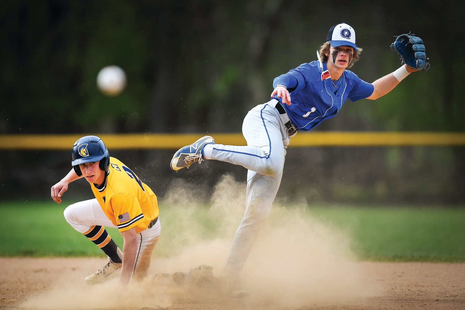 While trying to turn a double play, Panthers second baseman Caleb Everitt avoids the slide of Wissahickon’s Josh Palutis.