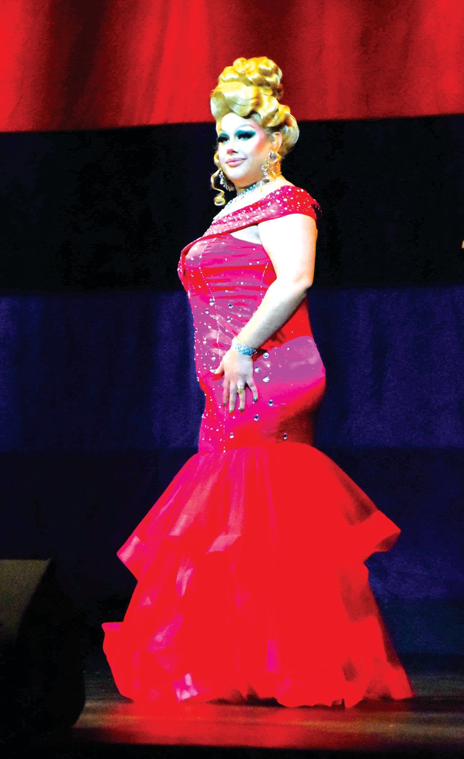 A Pride Pageant contestant competes in the formal wear category.
