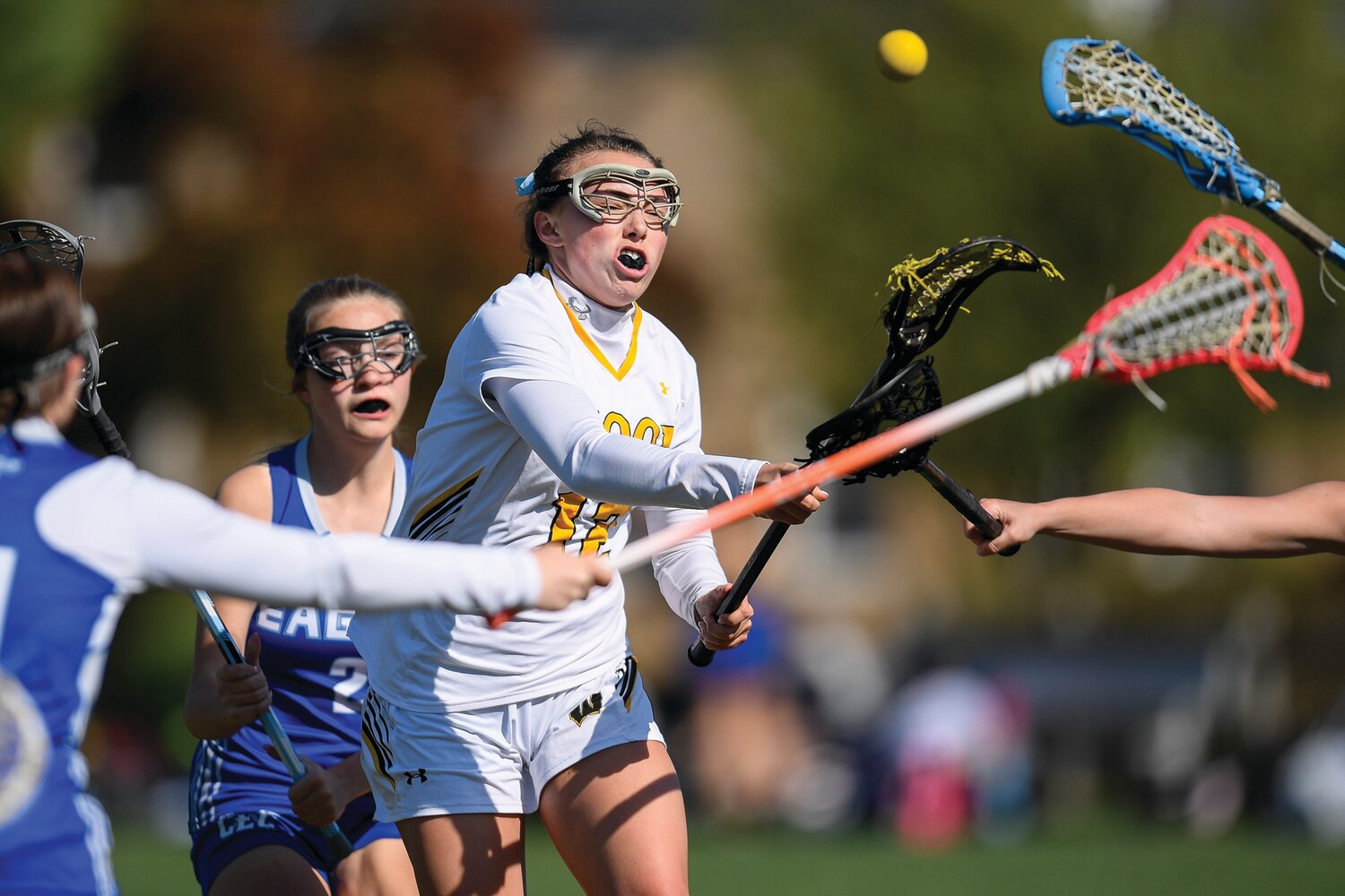 Archbishop Wood’s Grace Hoeger scores on a shot in front of the defense of Conwell-Egan during the second period.