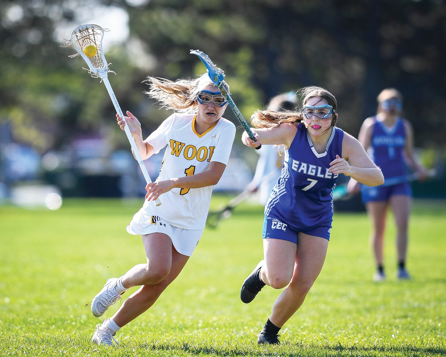 Archbishop Wood’s Cate DeGraw looks to shoot as she speeds around the attack of Conwell-Egan’s Lily Konnovitch.