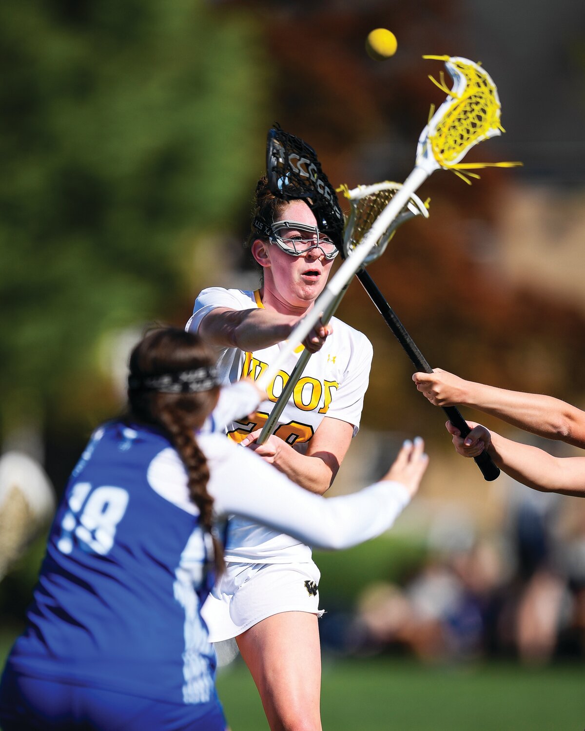 Archbishop Wood’s Grace Hoeger shoots and scores during the first period.