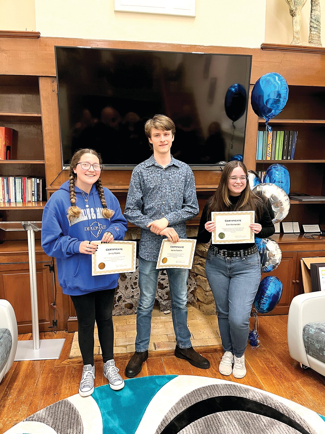 From left are: Emily Myers, Henry Franklin and Erin Hernandez, winners of the Bucks County Short Fiction Contest for High School Students.