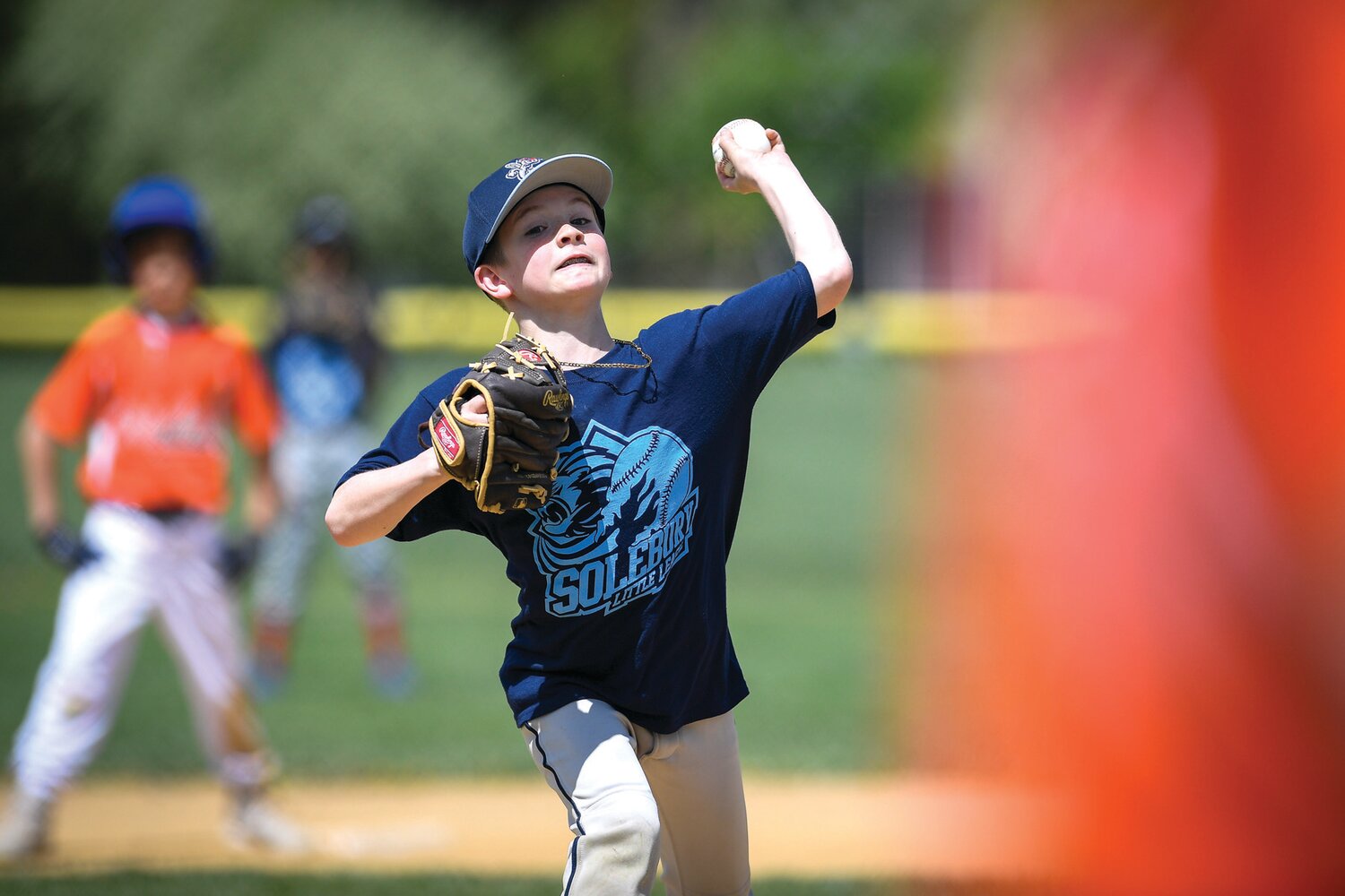 Joey Napoli, 10, pitches during a 10U Opening Day game.