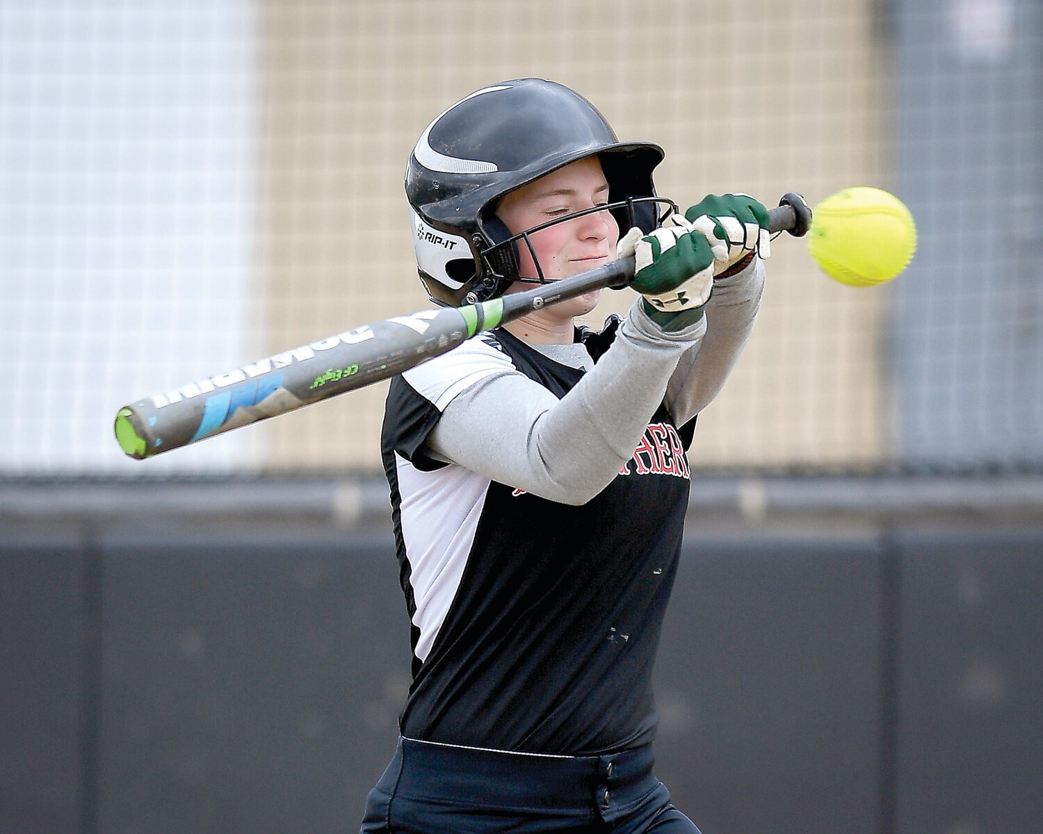 Plumstead’s Maddie Edgerton takes a hack at high pitch in the first inning.