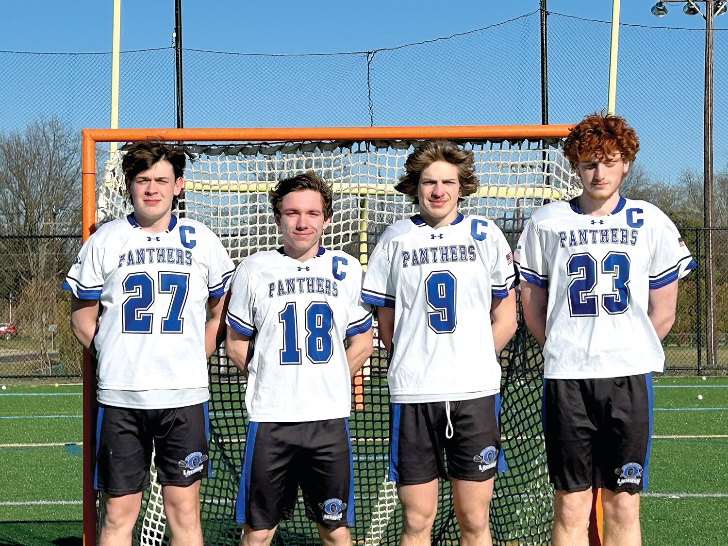 Quakertown boys lacrosse captains, from left, junior Cody Jefferson, seniors Jacob Wackerman and Jack Diliberto, and junior Colin Uhrich.