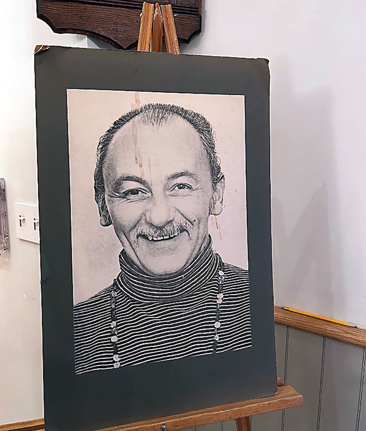 Photo of Jack Rosen stands on display at his 100th birthday celebration on April 21.