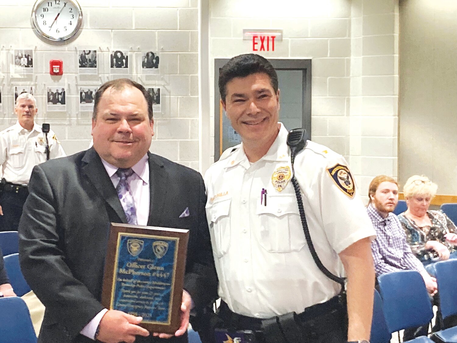 Middletown Township Police Officer Glenn McPherson, left, and Chief Joseph Bartorilla after McPherson was honored on retiring from his special role on the South and Central Bucks County Special Emergency Response Team.