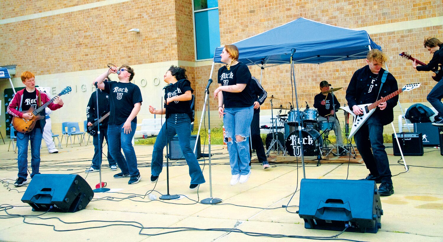 The band RockU performs during the “April Showers” event at Pennridge High School.