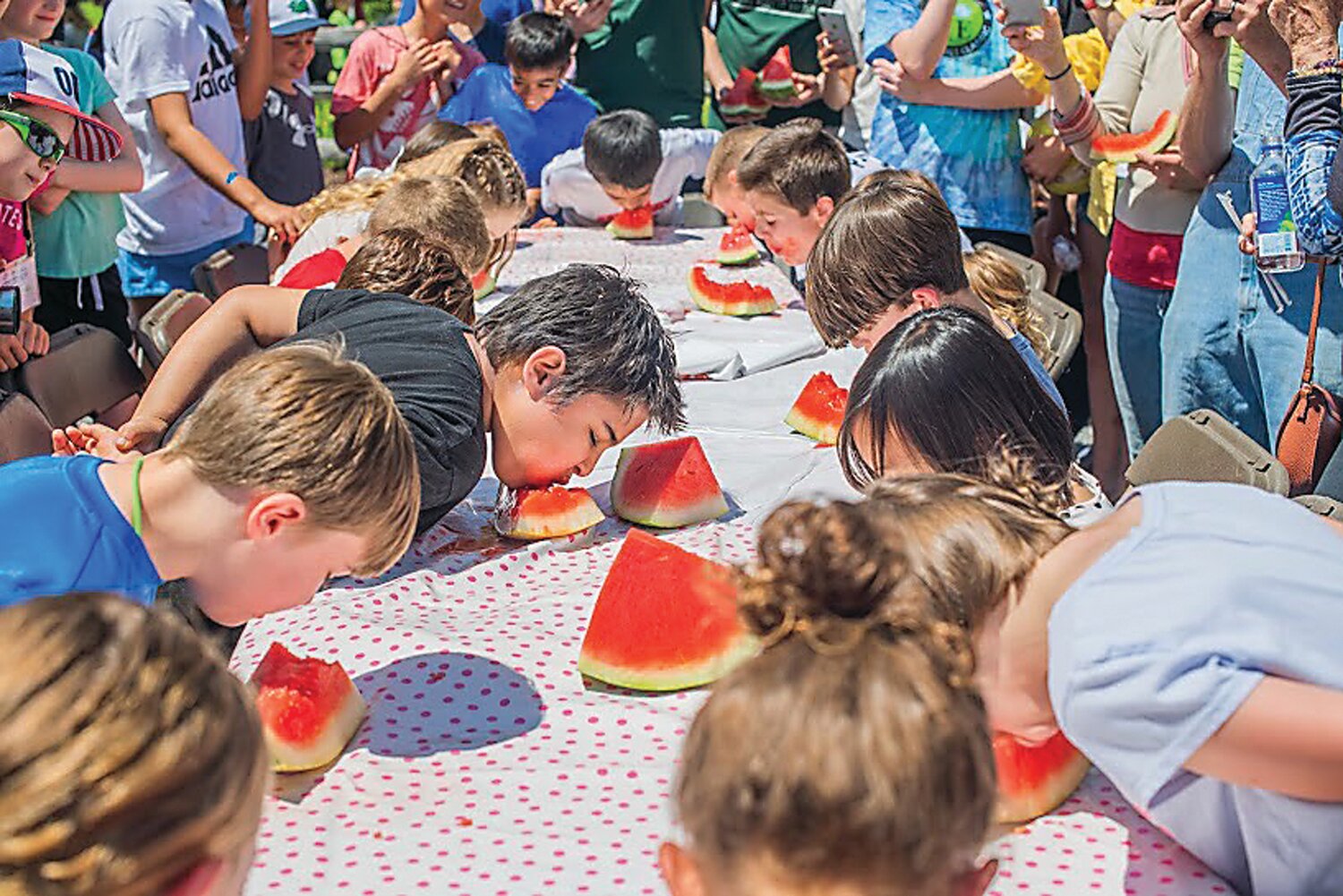 Children take part in a previous Carversville Day watermelon-eating contest.