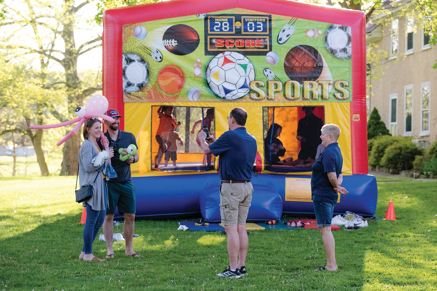 Solebury School’s outdoor celebrating featured a children’s area with bounce house, face painting, balloon art and games.
