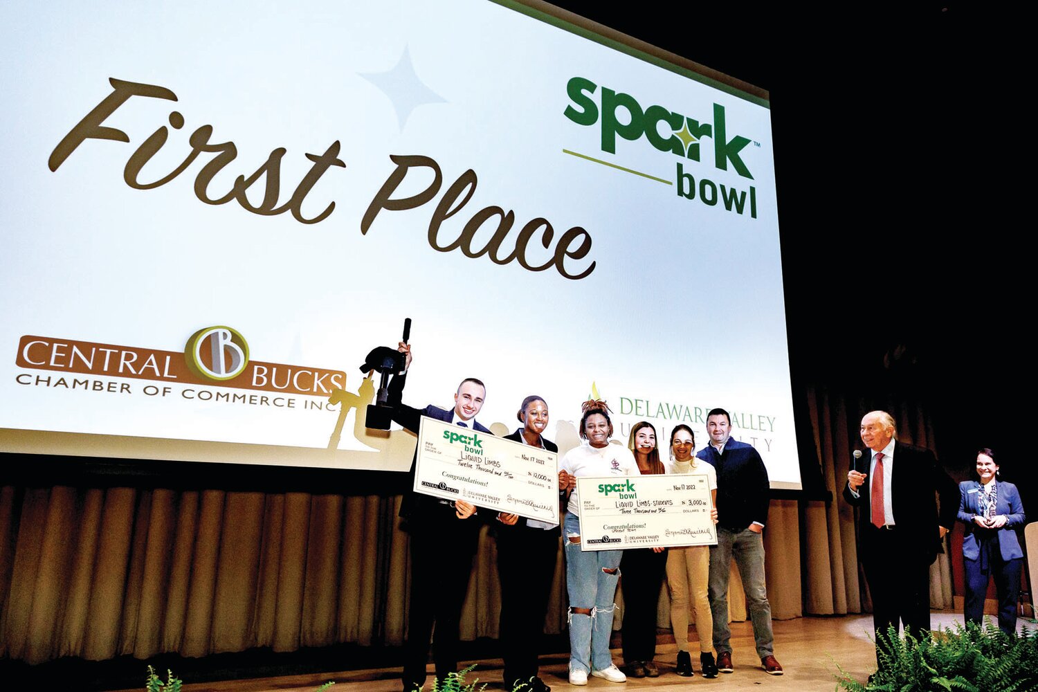 Last year's Spark Bowl winners, James Calcagni and Amoyah Gilliam, founders of Liquid Limbs, receive their prize onstage at Delaware Valley University.