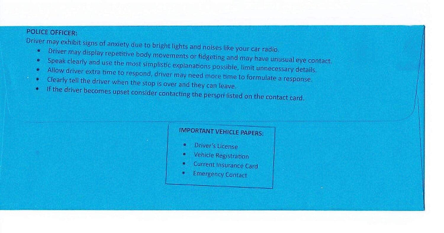 The back of a blue envelope, aimed at easing interactions between police and those on the autism spectrum.