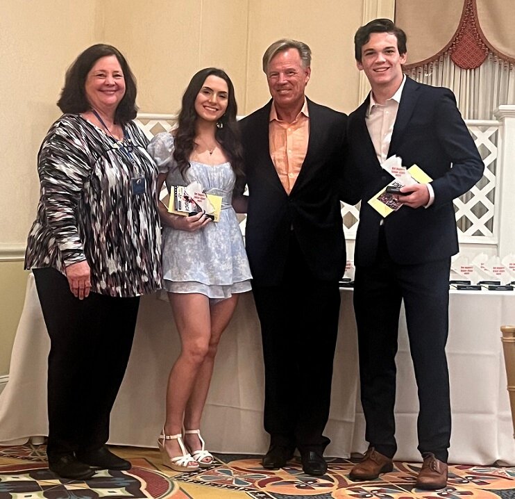Attending Wednesday night's 23rd annual Kiwanis Scholar-Athlete Awards Banquet were, from left, Kiwanis Club president Jill Saul, Central Bucks High School South's Victoria Zencak, Philadelphia Flyers great Brian Propp (guest speaker) and Central Bucks High School South's Brian Schmidt.