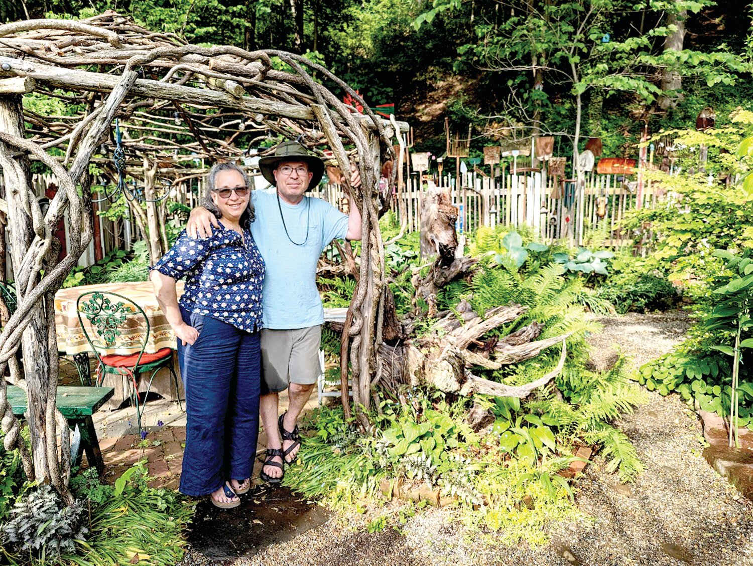 Lisa Stolzer and Matthew Jones are in their North Franklin Street garden.