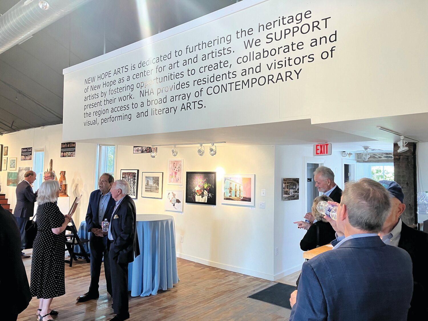 Following the ceremonial ribbon-cutting at the New Hope Arts Center on Stockton Avenue, board members, donors and dignitaries toured the renovated gallery on Tuesday morning.