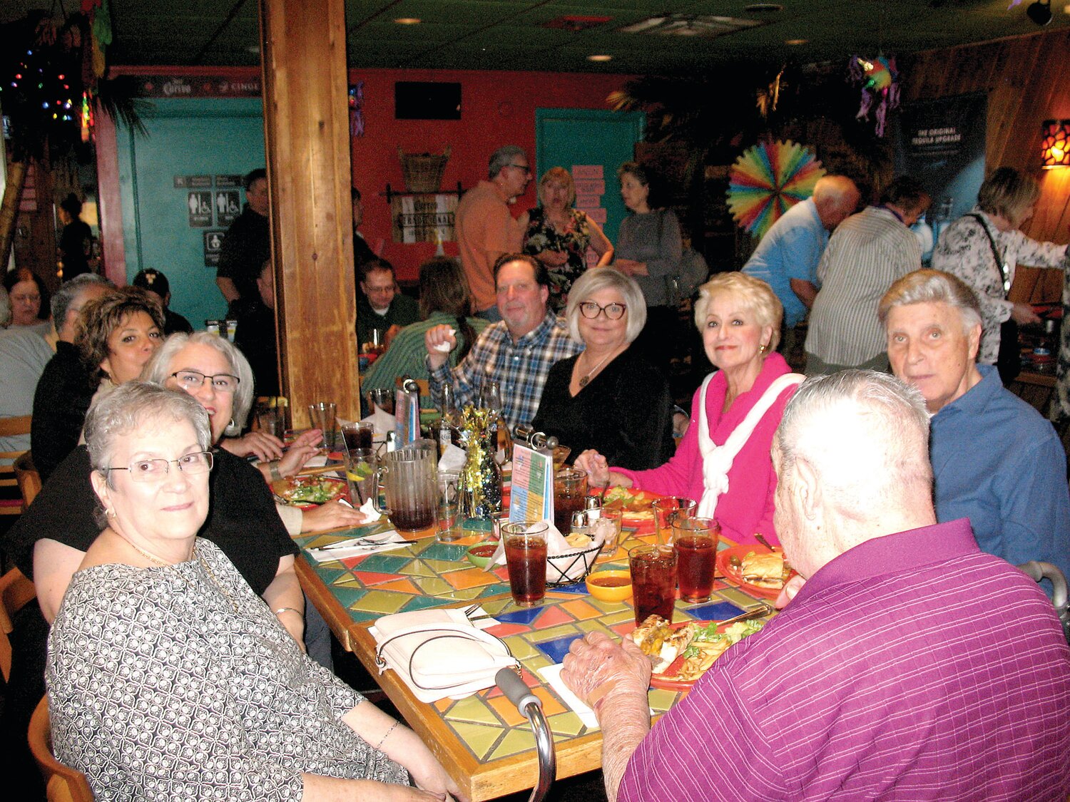 Guest enjoy Bucks County Antiques Dealers Association President Bill D’Anjolell’s 65th birthday celebration at Poco’s.