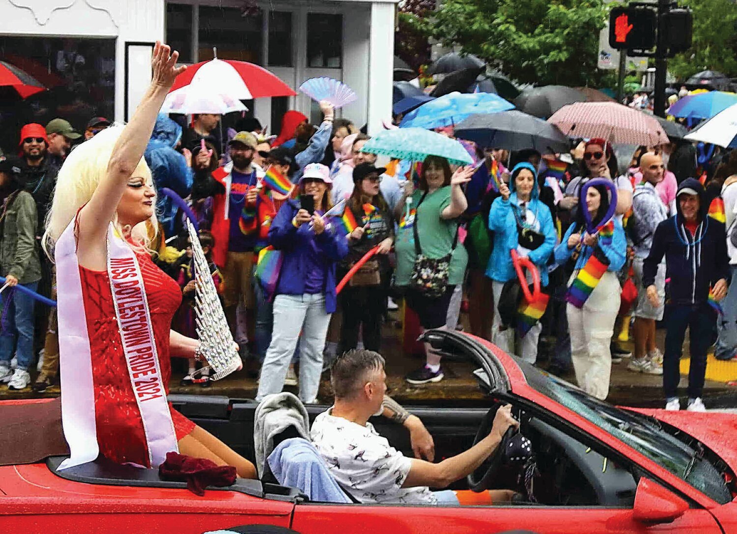 Miss Doylestown Pride 2021 rides along the parade route.