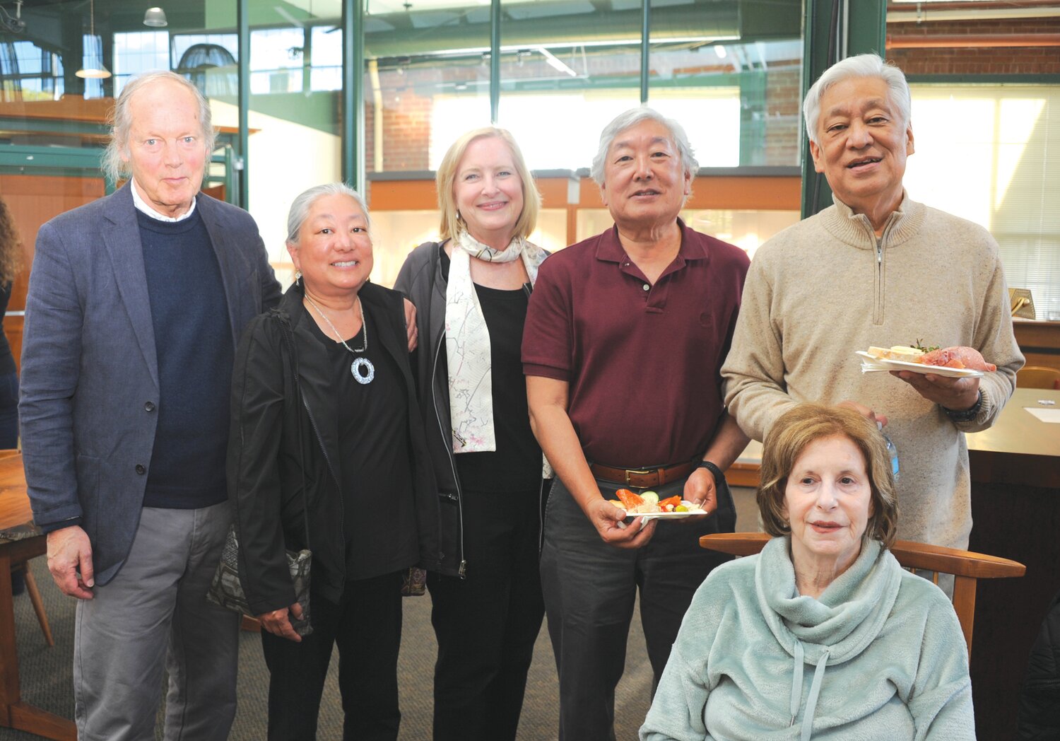 Joyce Cohen, sitting, and  Jon Yarnall, Linda Murakami, Mandy Murakami, Keith Murakami and Bob Murakami.