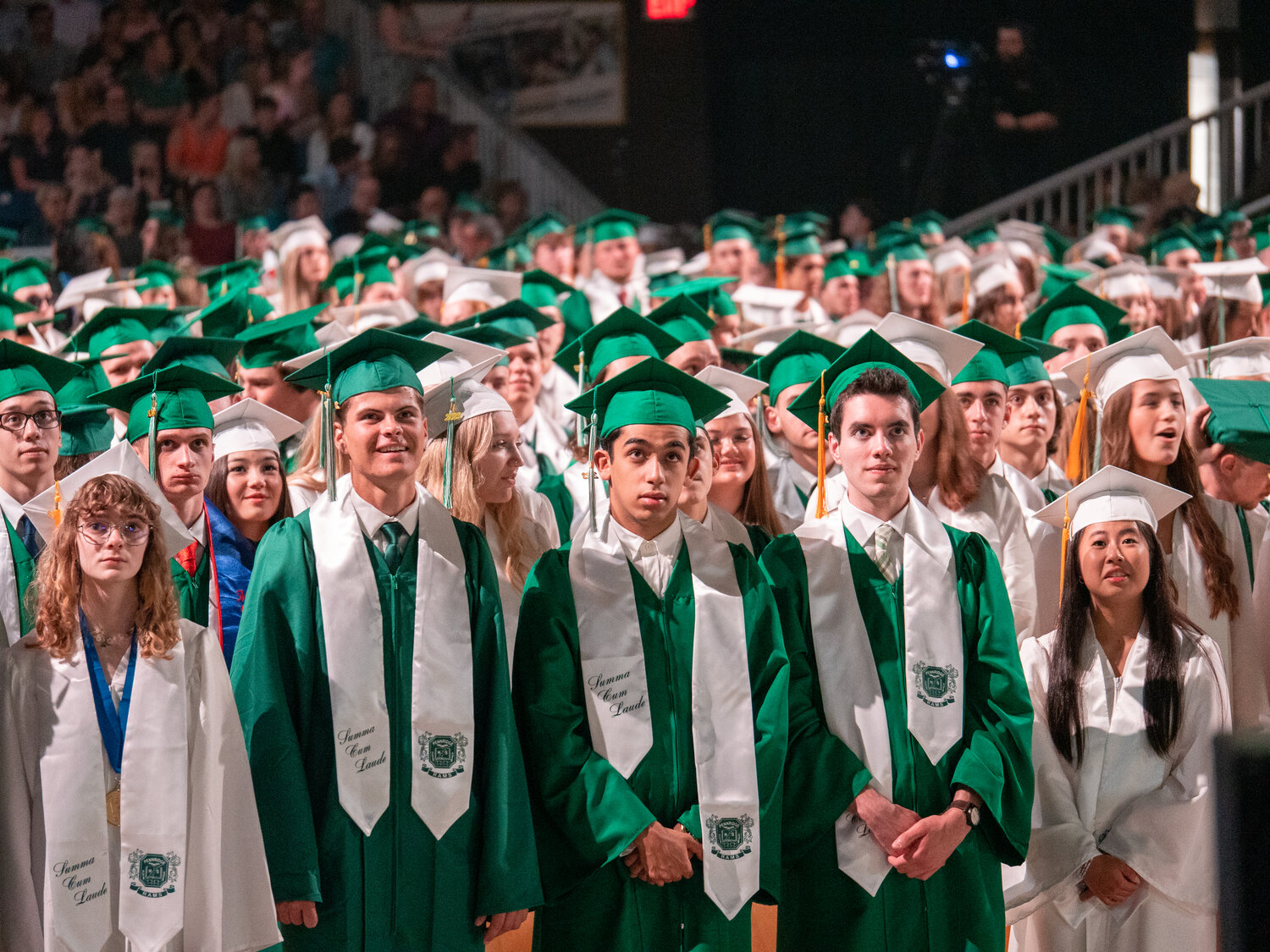 The Pennridge High School Class of 2023 stands at attention during Tuesday's commencement prior to turning their tassels to the left side, signifying their transition to graduates.