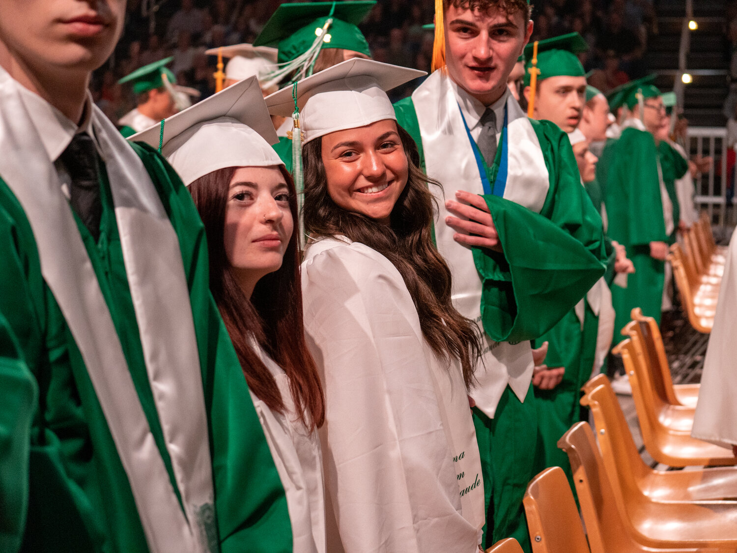 Students take their places on the floor of the Stabler Arena Tuesday for the start of the Pennridge High School graduation ceremony.