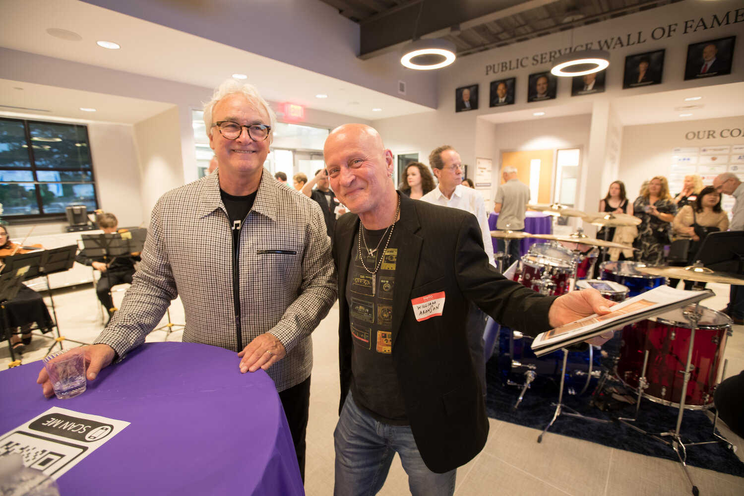 Doylestown musician Bill Aronson chats with The Bucks County Music project founder Richard Towey following the inaugural meeting held at the PA Biotech Center of Bucks County in Buckingham.