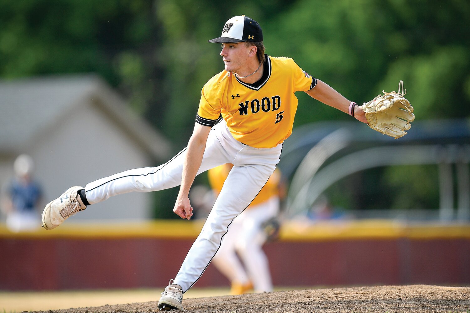 Archbishop Wood starting pitcher Braden Kelly delivers a pitch during first-inning action in which Dallas answered back with a run, tying the game at 1 apiece.