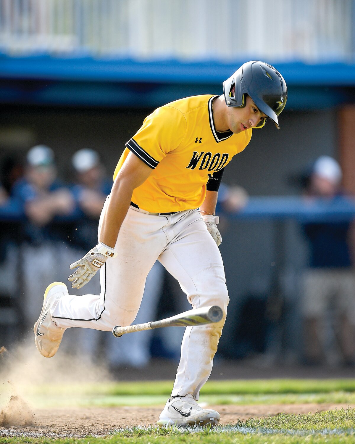 Wood’s Joey Gale slams his bat after popping out in the top of the seventh inning.