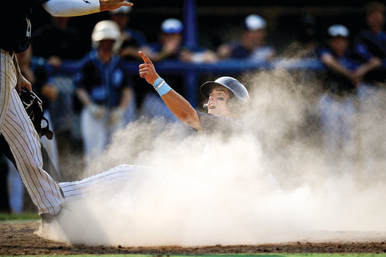 Dallas’ Joe Peters scores during the six-run fourth inning, which blew the game open at 8-1.