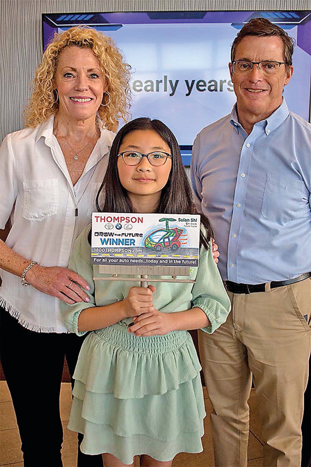 Draw the Future grand prize winner Sulan Shi, a Central Bucks School District sixth grader, with Laura Thompson Barnes and John Thompson.