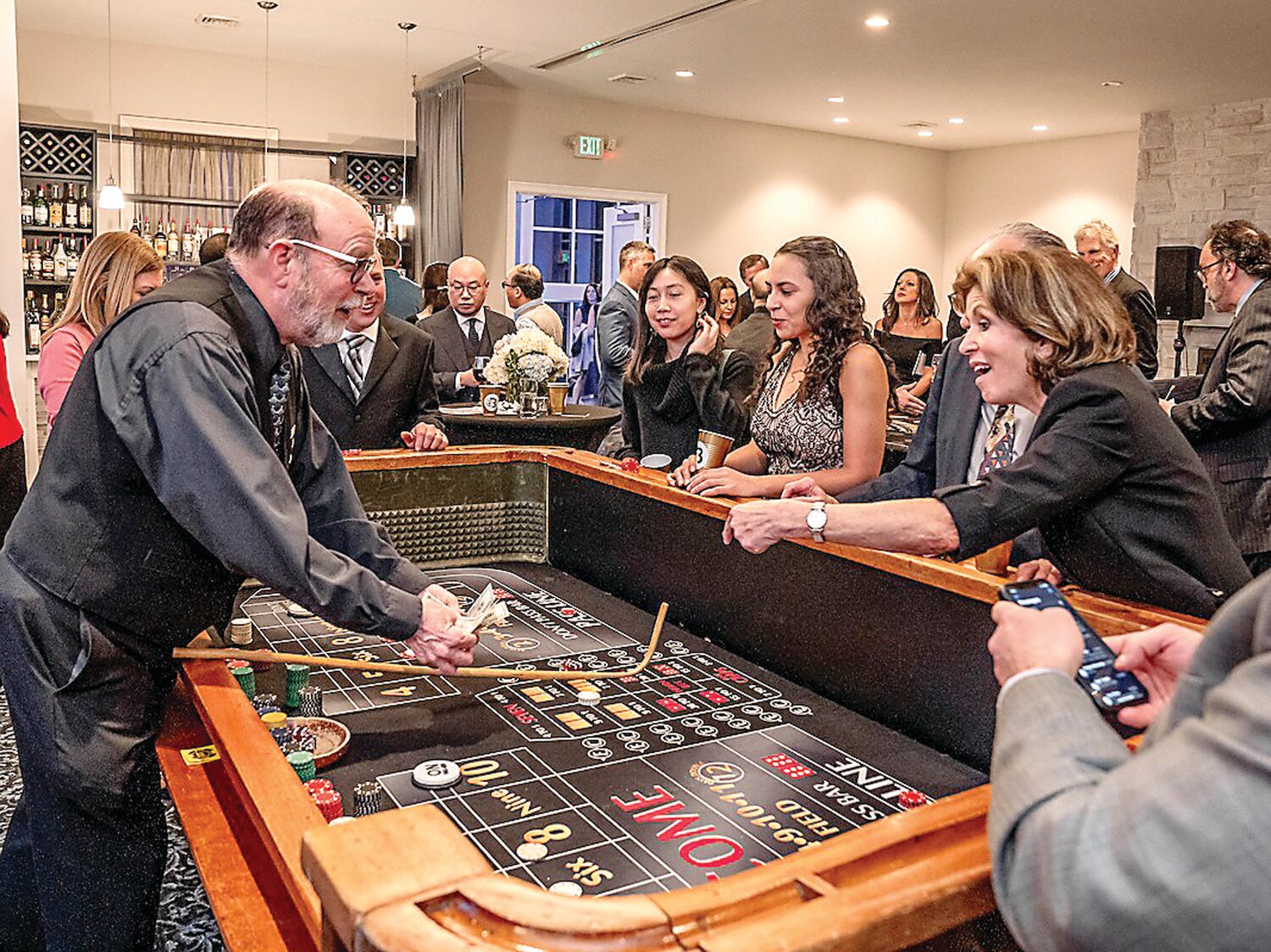 Hepatitis B Foundation Gala attendees enjoy casino games.