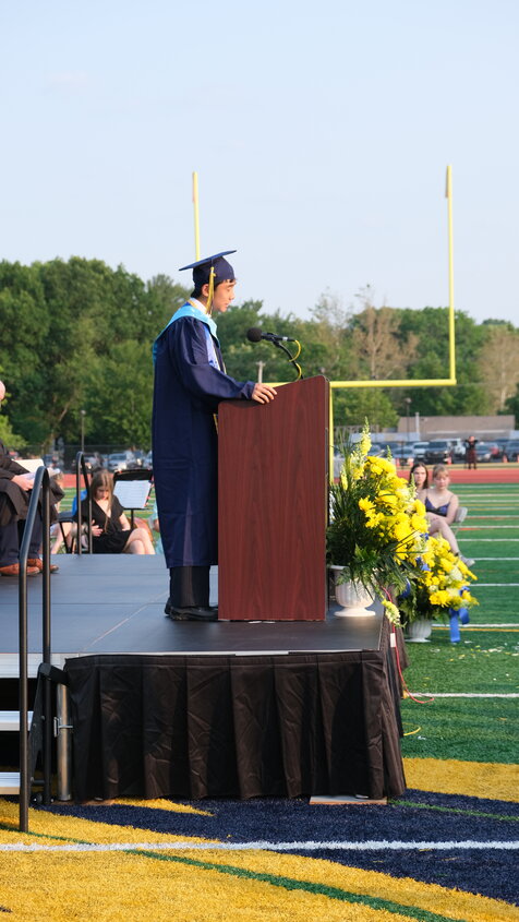 New Hope-Solebury High School Class of 2023 valedictorian Adrian Li addresses his classmates during Tuesday the June 6 graduation ceremony at the football stadium.