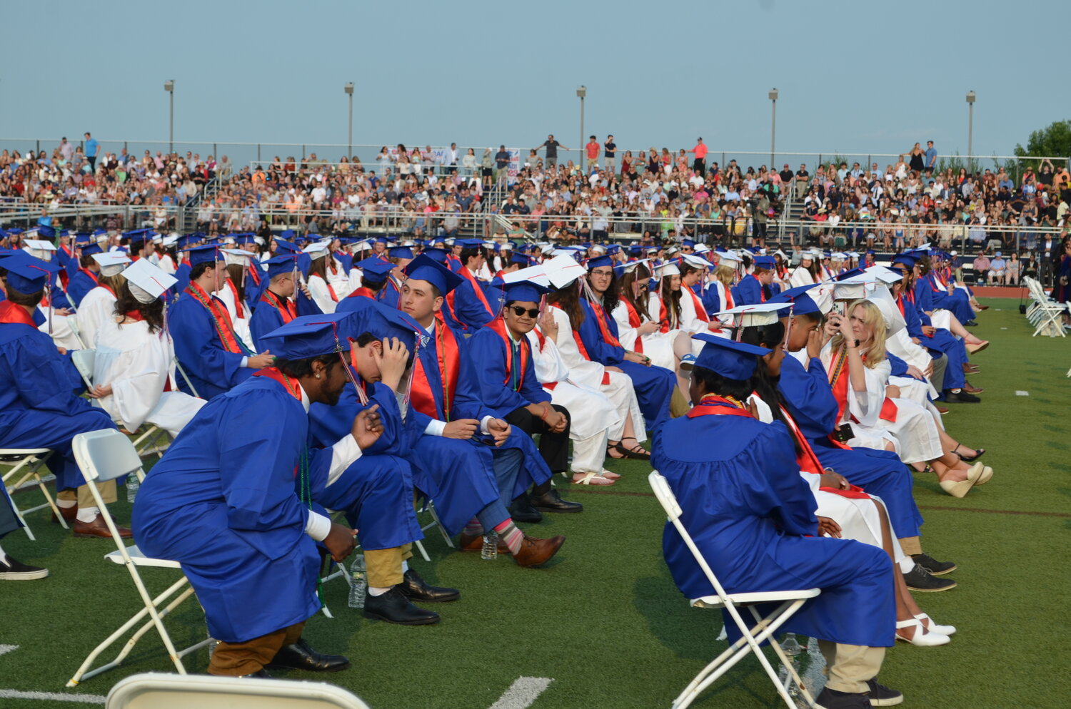 Central Bucks High School East graduates take their seats at the start of their commencement ceremony on June 14.