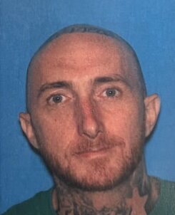 Beau Booth, 41, wanted for robbery and other charges was apprehended in Doylestown Monday following a four-hour manhunt.