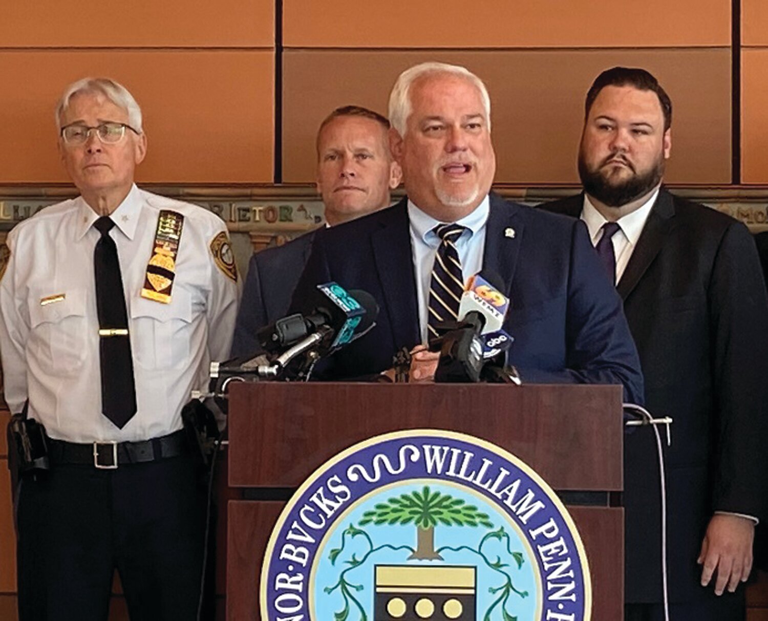 Bucks County District Attorney Matt Weintraub is surrounded by other law enforcement officials Tuesday during a press conference announcing the dismantling of a large scale catalytic converter theft ring.