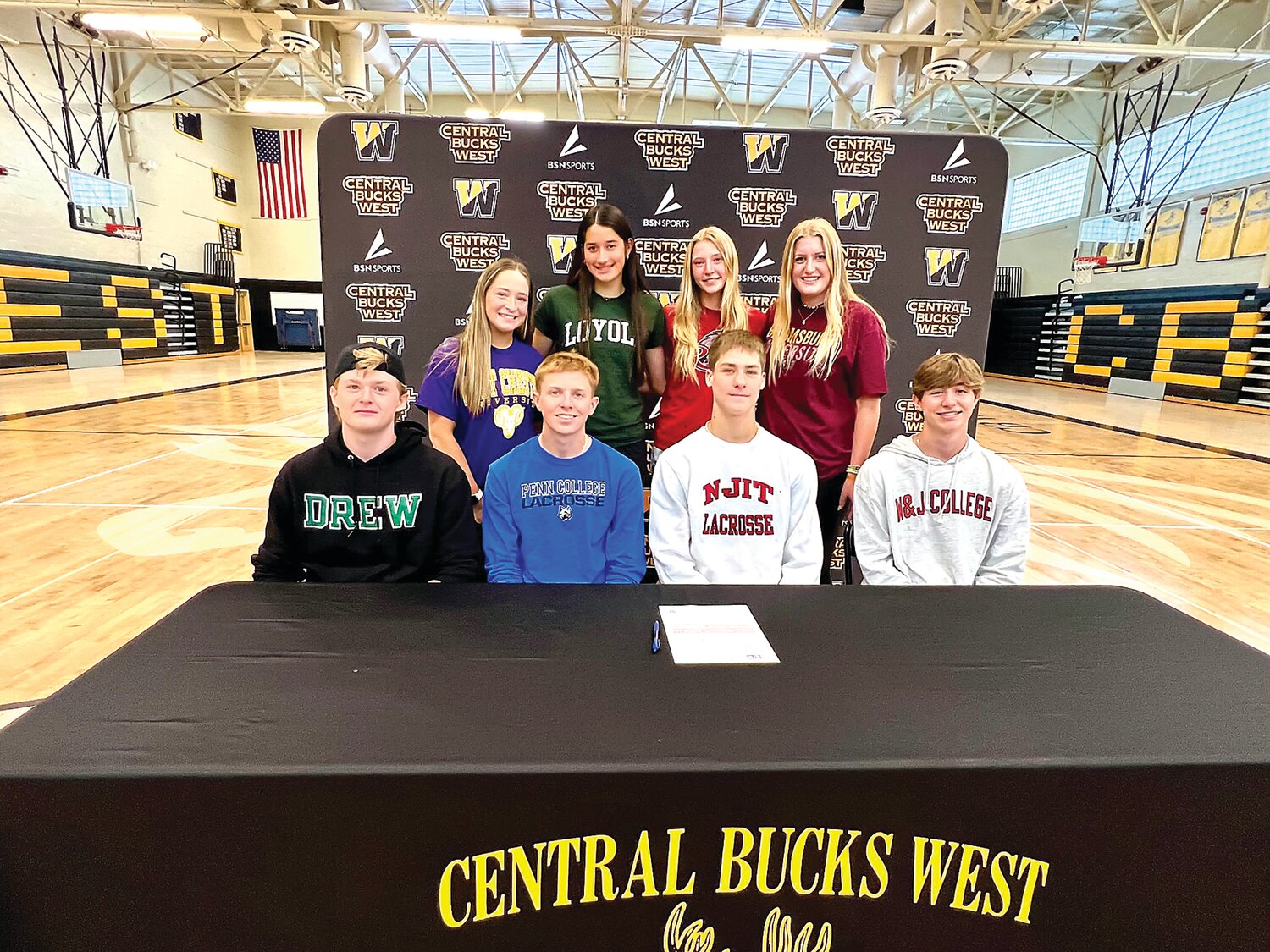 Central Bucks West recently recognized eight seniors for their commitment to compete in collegiate sports. From left are: Will Shandlay, Billy Trimbur, Austin Hahn, Cole Young; back row, Camrynn Pellegrini, Claire Dalsass, Maile McFadden and Sarah Miller.