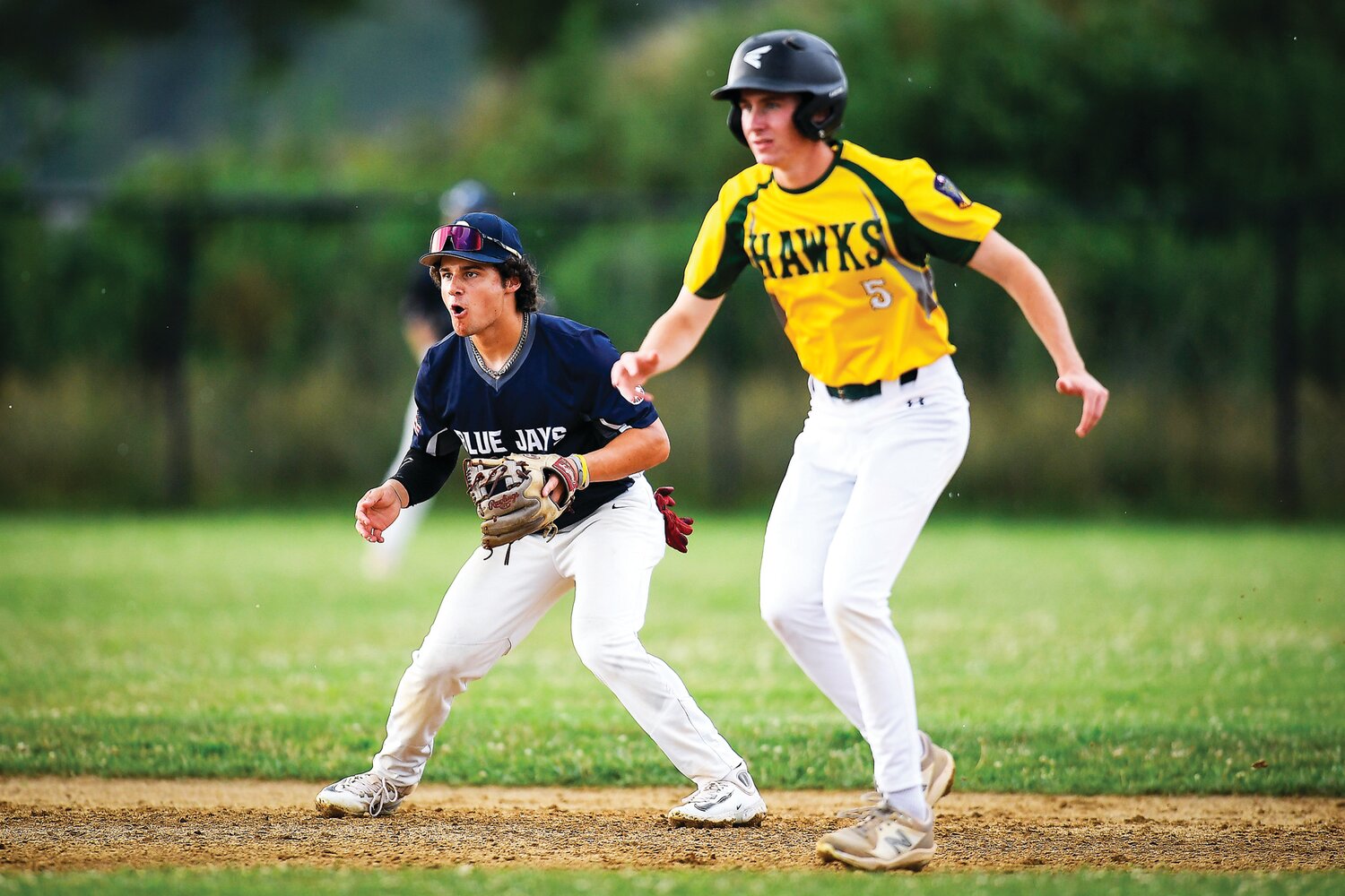 Quakertown shortstop Danny Qualteria during second-inning play Monday as Nor-Gwyn’s Will Chiappa leads off the bag.