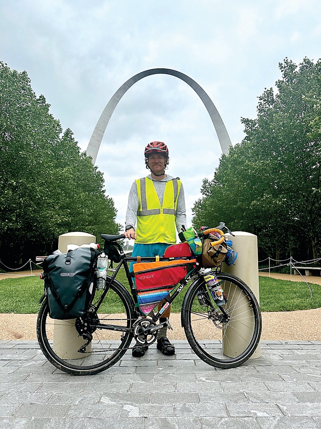 Spencer McCullough, who grew up in Yardley, poses under the Gateway Arch in St. Louis. The Gateway Arch National Park is near the starting point of the famous Lewis and Clark Expedition. McCullough is on an expedition of his own.