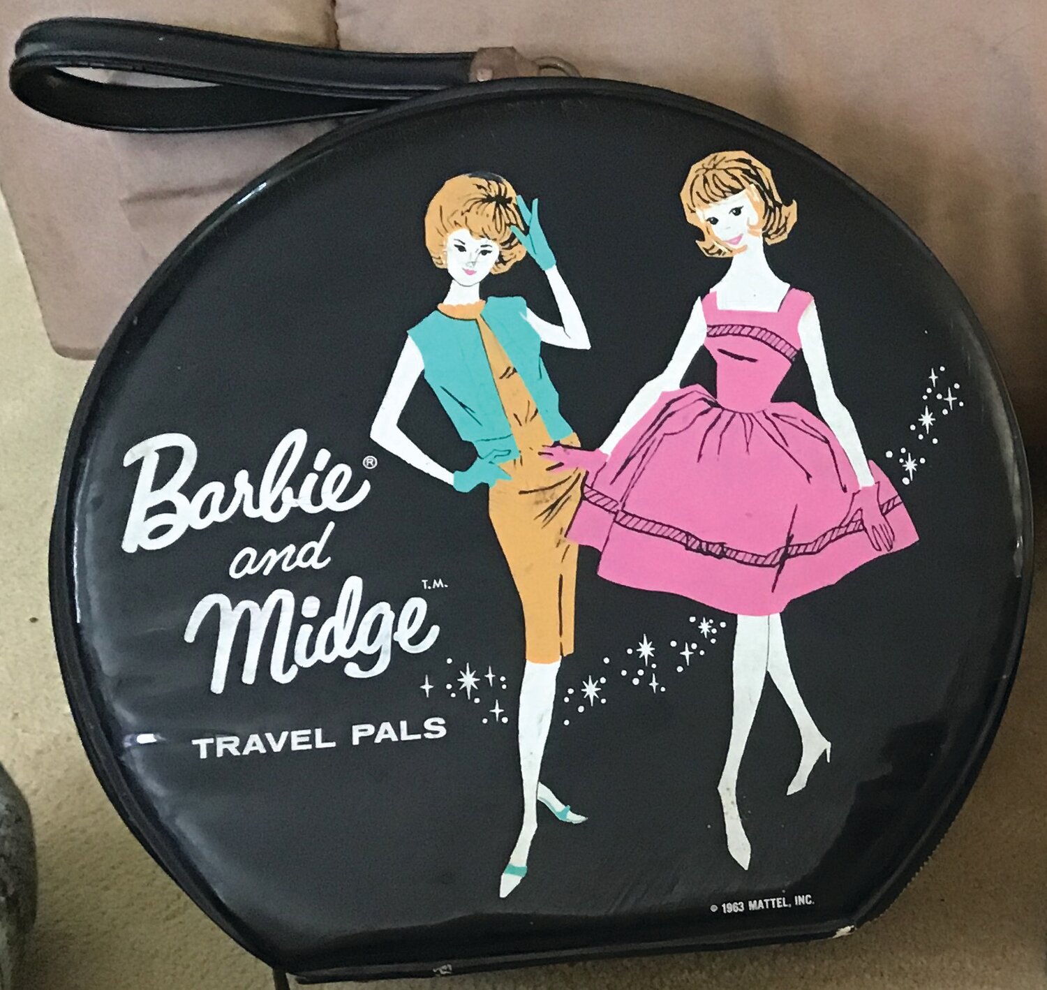 The Barbie and Midge travel case.