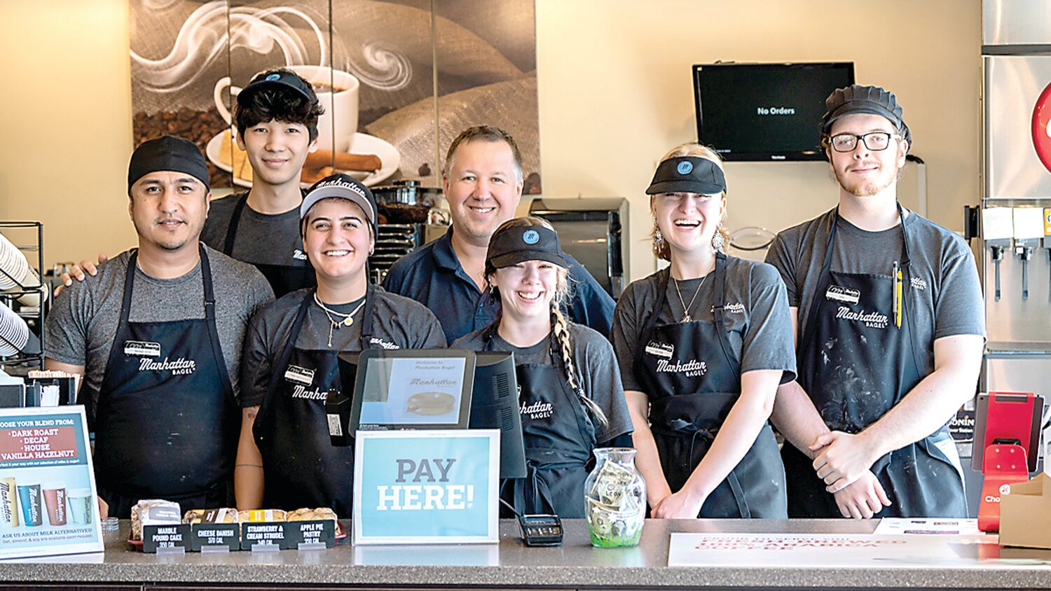 The staff of the Manhattan Bagel in Southampton.