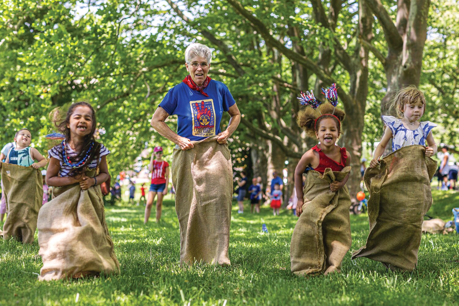 Kids of all ages take part in a sack race at last year’s Fonthill Castle 4th of July celebration.