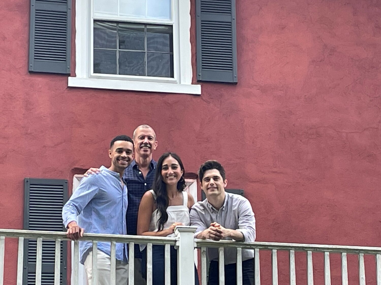 (From left) Noah J. Ricketts, Alex Fraser,  Krystina Alabado and Andy Mientus stand on the balcony at the Hammerstein home. Fraser is producing director for the Bucks County Playhouse, which is running“Tick, Tick...Boom!”  this month. Ricketts, Alabado and Mientus are cast members in the production.